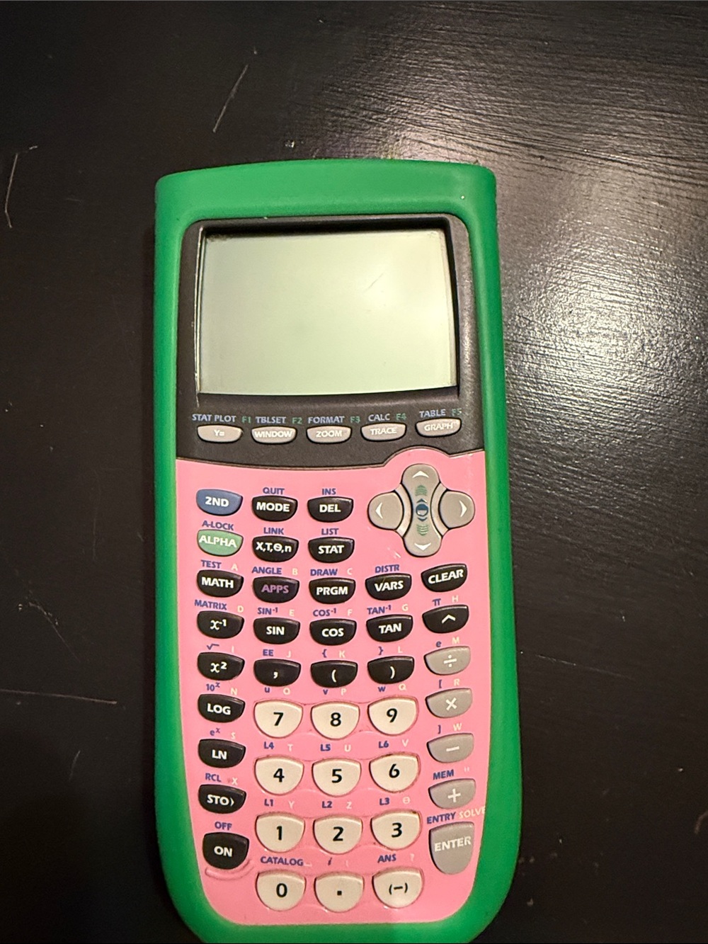 Texas Instruments Ti-84 Plus
 Scientific Graphing Calculator with green case